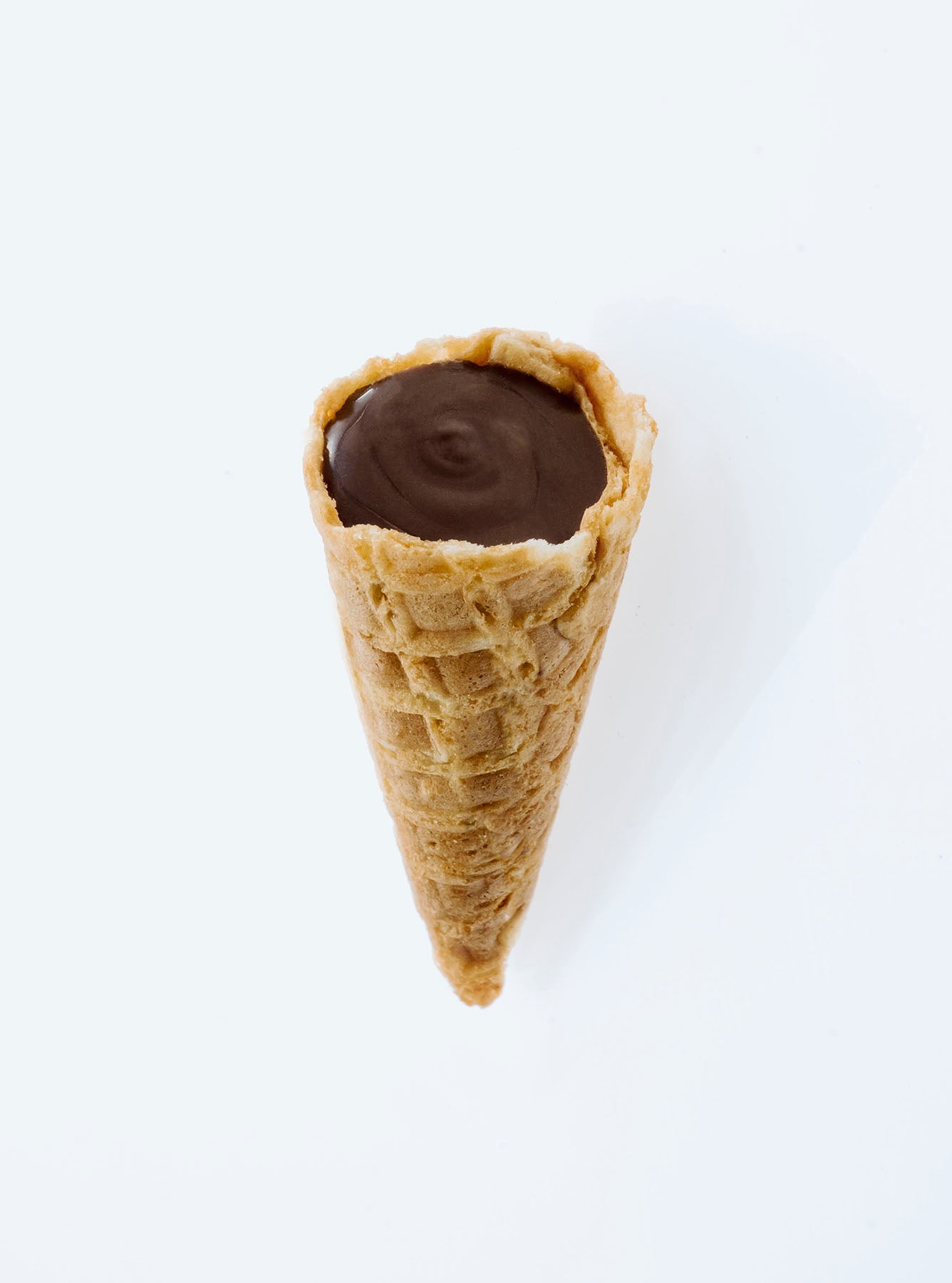 Close-up of Dark Choc Tippies showing the crunchy waffle cone and dark chocolate flavoured filling inside