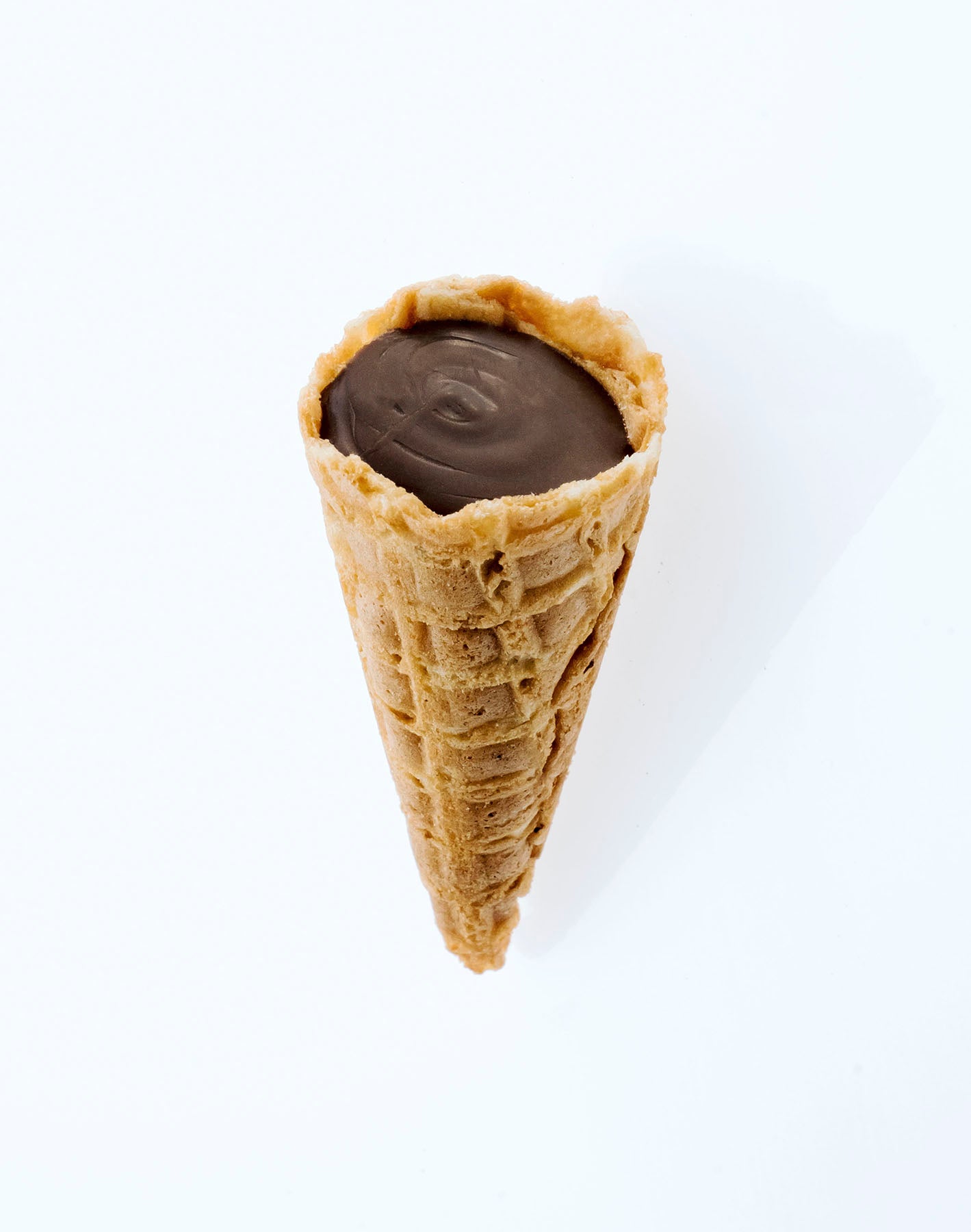Close-up of Milk Choc Tippies showing the crunchy waffle cone and milk chocolate flavoured filling inside